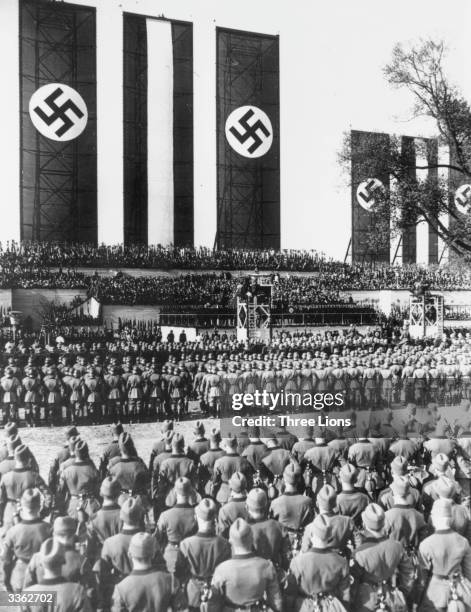 Massed ranks of German soldiers at the Tempelhof airfield to listen to a May Day speech by Hitler as Chancellor.
