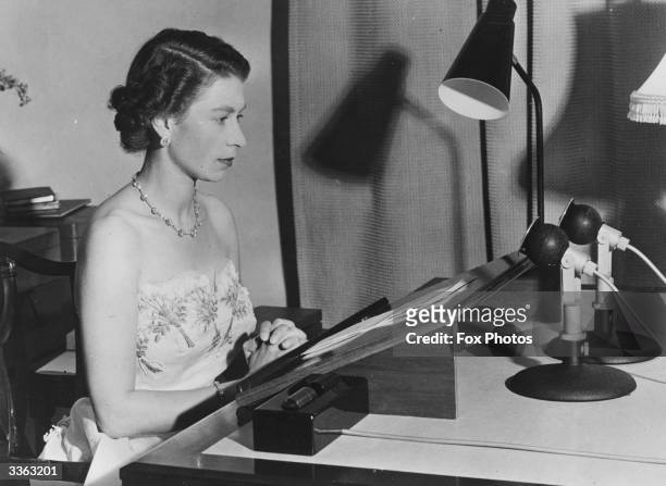 Queen Elizabeth II making a radio broadcast from Auckland, New Zealand during a Royal tour of Australasia.