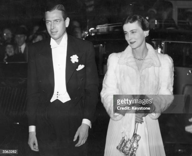 The Duke of Kent with his wife Princess Marina attending a gala performance at the Victoria Palace Theatre in London.