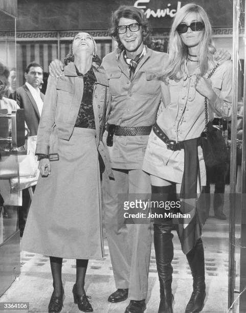Fashion designer Yves St Laurent opening his shop 'Rive Gauche' in Bond Street, London with fashion models Loulou de la Falaise and Betty Catroux .