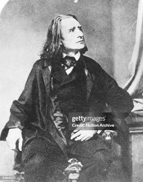 Hungarian-born pianist and composer Franz Liszt , originator of the solo piano recital.