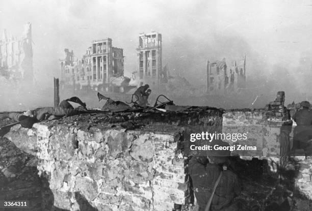 Stalin Attack Red Army troops storming an apartment block amidst the ruins of... News ...