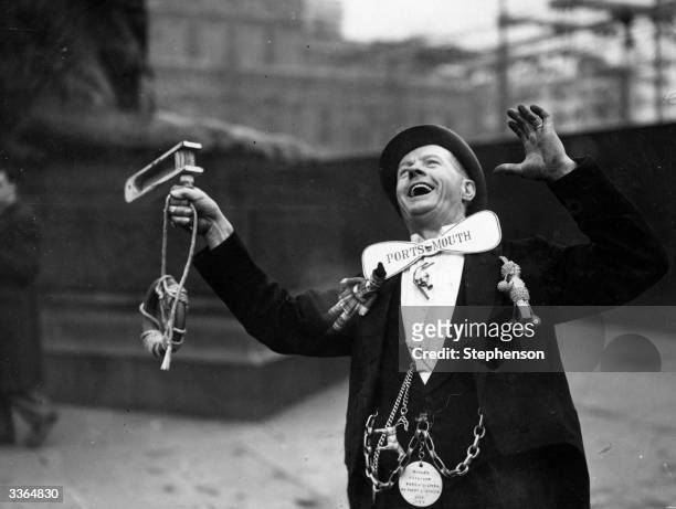 Portsmouth Football Club supporter cheering his team in Trafalgar Square, London, before their FA Cup Final match against Wolverhampton Wanderers at...