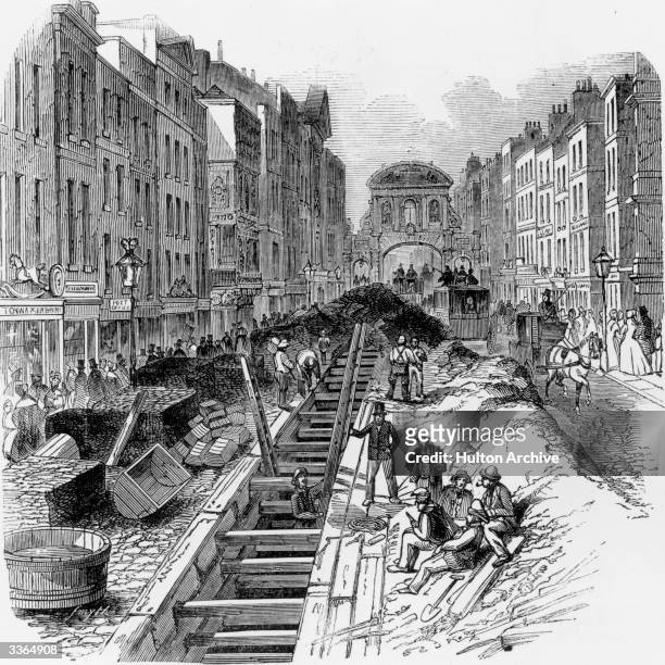 Workmen deepening the sewage system that runs under London's Fleet Street. Original Publication: Illustrated London News - pub. 1845