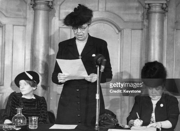 Eleanor Roosevelt, American humanitarian and wife of President Franklin Delano Roosevelt, speaking at a conference. With her are British Labour...