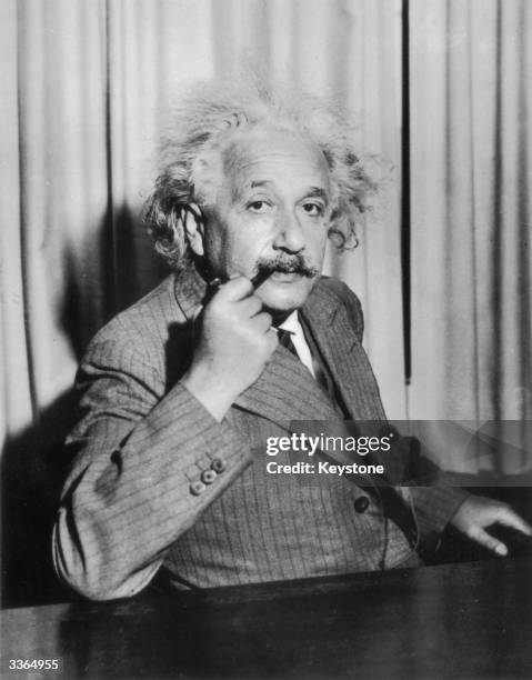 German-Swiss-American mathematical physicist Albert Einstein .