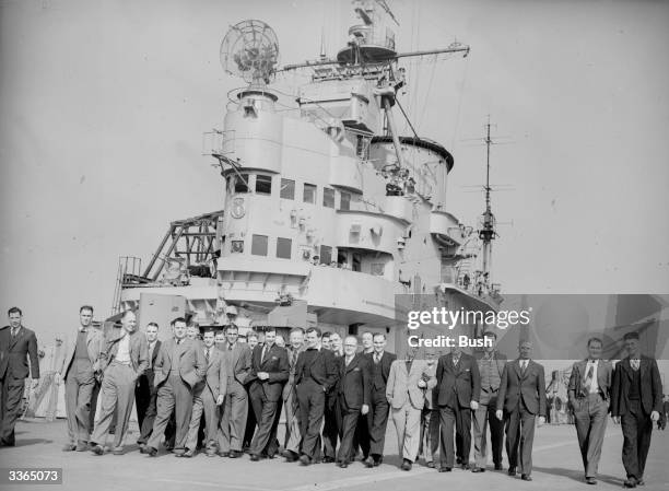 The England Rugby League team on board the aircraft carrier 'HMS Indomitable', bound for Australia.