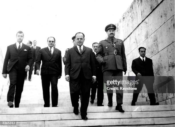 Greek Prime Minister Georgios Papadopoulos leaving the tomb of the unknown soldier in Athens having laid a commemorative wreath on the anniversary of...
