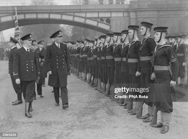 King Haakon of Norway and Admiral Corneliusen inspect the Kingston 'Seafast' Sea Cadet Corps.