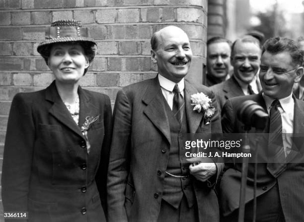 British prime minister Clement Attlee smiles to well-wishers outside Transport House after Labour's victory in the General Election, London, July 26,...