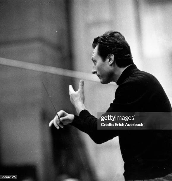 Italian conductor Carlo Maria Giulini conducting.