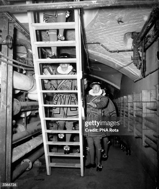 The Yeomen of the Guard, who form the Queen's bodyguard perform the traditional search of the vaults under the Houses of Parliament in London, prior...