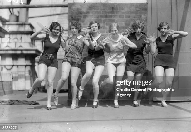 Dancers demonstrating steps from the 'Charleston'.