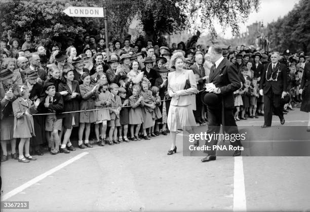 Crowds of fans greet Princess Elizabeth as she walks the streets of Northampton, on her way to open the General Hospital and Grendon Hall, the County...