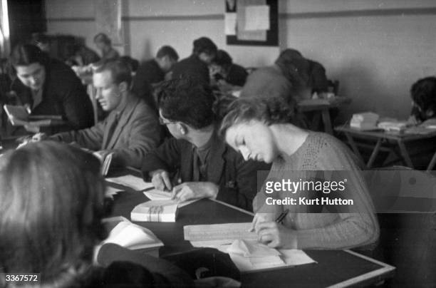 Oxford University undergraduates prepare by-election statements during the Oxford by-election. Original Publication: Picture Post - 32 - Crisis...