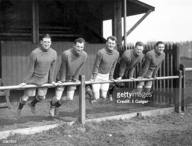 Members of Huddersfield Town football team training at Buxton, Derbyshire, for their forthcoming FA Cup Final match against Arsenal at Wembley. Left...