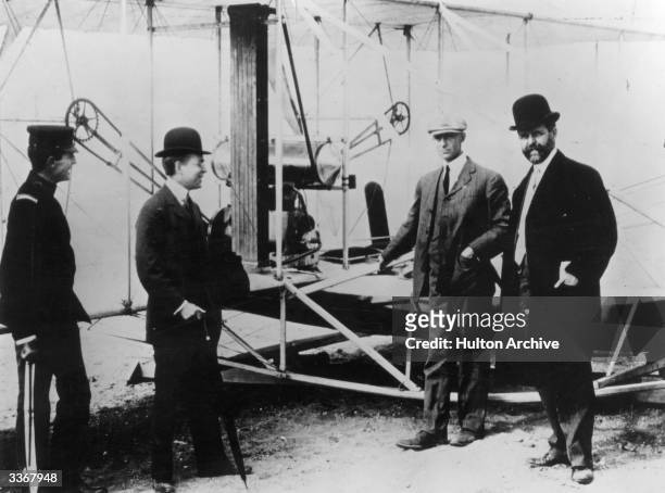 Captain Halstead Dovey, James M. Beck, chairman of the Aeronautic Committee of the Hudson-Fulton Celebration, mechanic Charlie Taylor, Wilbur Wright,...