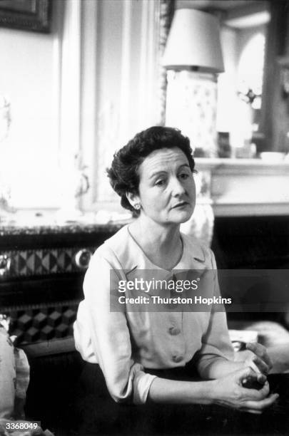English writer Nancy Mitford . Daughter of the 2nd Baron Redesdale, she moved in upper class circles and satirized the British upper classes in...
