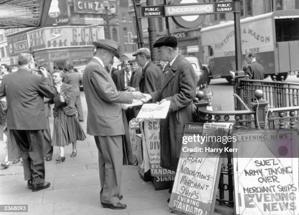 The London Evening Standard announces the actions of prime minister Anthony Eden during the Suez Crisis, including the requisitioning of merchant...