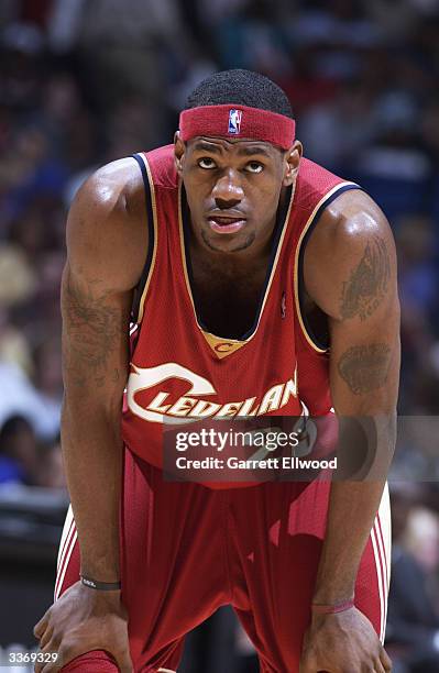 LeBron James of the Cleveland Cavaliers rests during the game against the Memphis Grizzlies at The Pyramid on April 7, 2004 in Memphis, Tennessee....