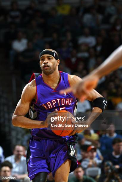 Vince Carter of the Toronto Raptors studies the court during the game against the Milwaukee Bucks on April 14, 2004 at the Bradley Center in...