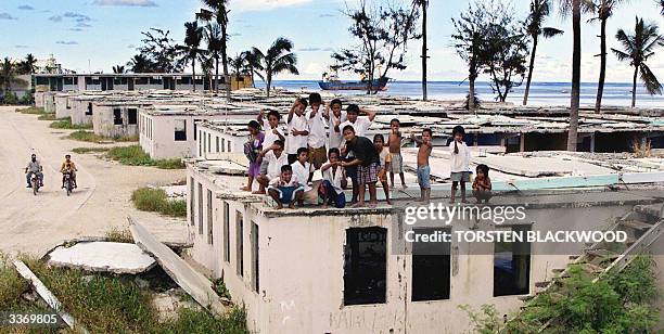 Photo dated 11 September, 2001 of squalid housing in the bankrupt island state of Nauru, the world's smallest republic, which is on the verge of...