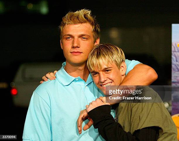 Aaron and Nick Carter aririve for the "Simple Life 2" Welcome Home Party at The Spider Club on April 14, 2004 in Hollywood, California.