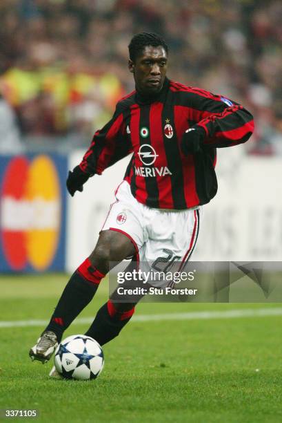 Clarence Seedorf of AC Milan runs with the ball during the UEFA Champions League Quarter Final, First Leg match between AC Milan and Deportivo La...