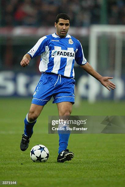 Nourredine Naybet of Deportivo La Coruna runs with the ball during the UEFA Champions League Quarter Final, First Leg match between AC Milan and...