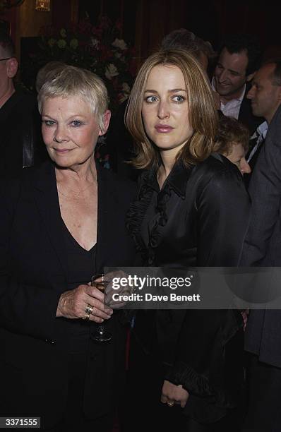 Actresses, Dame Judi Dench and Gillian Anderson at the UK Neurofibromatosis Association 20th Anniversary Gala Concert, held at the Theatre Royal on...