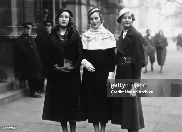 Three of the Mitford sisters at Lord Stanley of Aldernay's wedding. From left to right: Unity Mitford; Diana Mitford and writer Nancy Mitford.