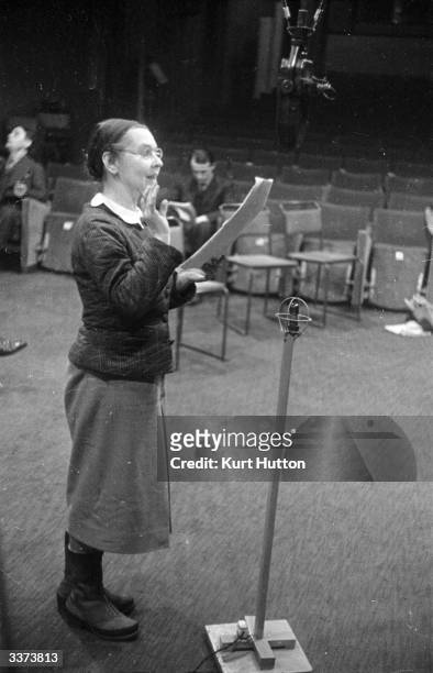 Russian born ballerina and wife of the economist John Maynard Keynes, Lydia Lopokova reading from a script during a BBC radio recording of Tolstoy's...