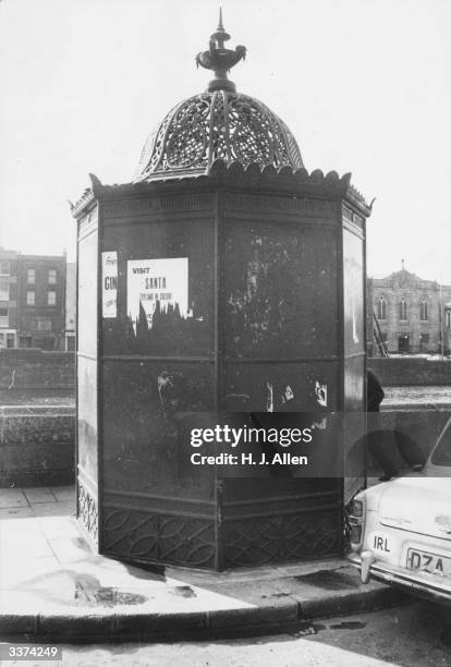 Pissoir on the banks of the river Liffey in Dublin.