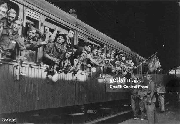 Government troops leave Barcelona during the Spanish Civil War by train.