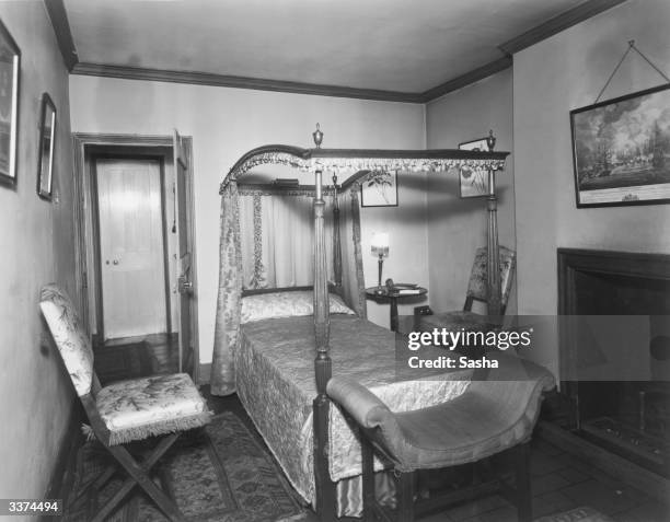 The bedroom of producer and stage director Robert Milton's home at 19 Grosvenor Mews near Oxford Street, London.