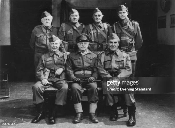 Characters from the popular TV series 'Dad's Army'. Seated left to right - Clive Dunn as Corporal Jones, Arthur Lowe as Captain Mainwaring and John...