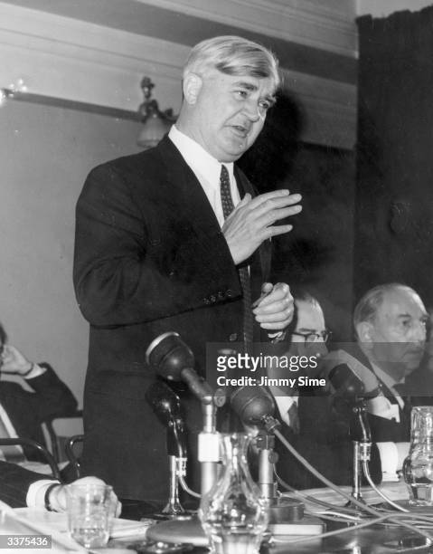 Labour politician Aneurin Bevan presenting the party's general election manifesto, his fellow politician and former Welsh coalminer, Jim Griffiths is...
