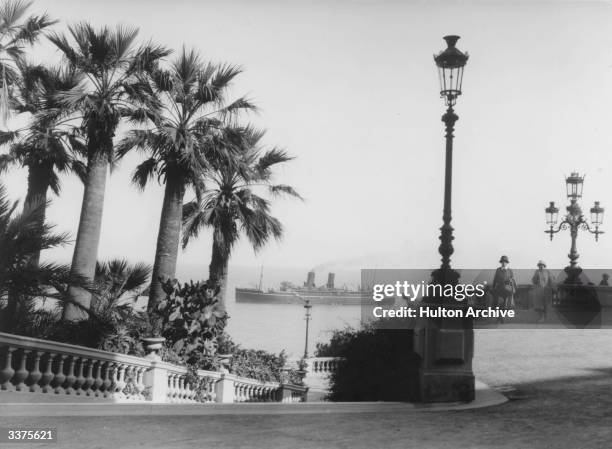 Palm trees and lampposts on Casino Terrace at Monte Carlo.