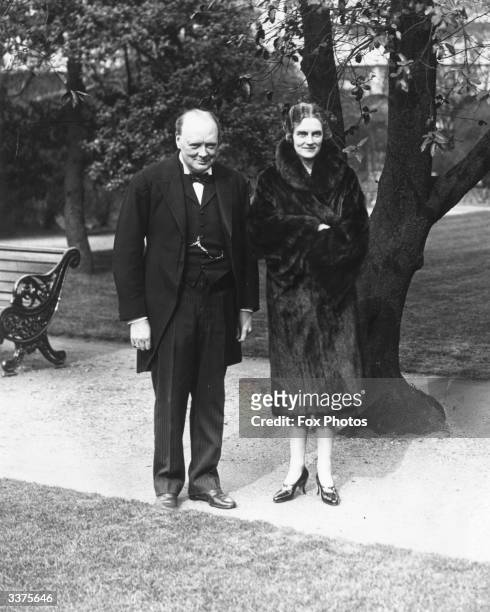 British politician Winston Churchill with his wife Lady Clementine photographed in the gardens at 10 Downing Sreet before it became his home as Prime...