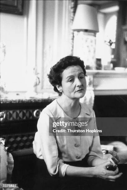 English writer Nancy Freeman Mitford in her apartment in Paris. One of the essayists in 'Noblesse Oblige', edited by herself, she helped to originate...