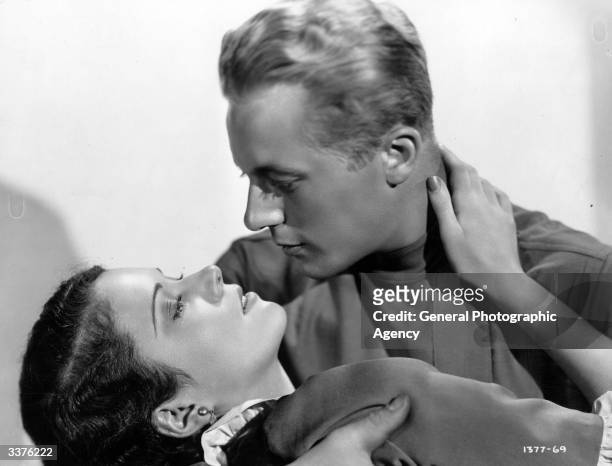 American actors Raymond Gene and Marguerite Churchill in a scene from the film 'Forgotten Commandments'.