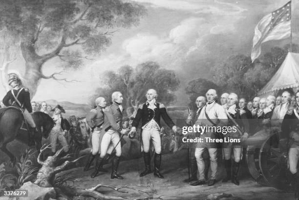 British General John Burgoyne, escorted by General Phillips, offers his sword in surrender to American General Gates, outside Gates' marquee at...