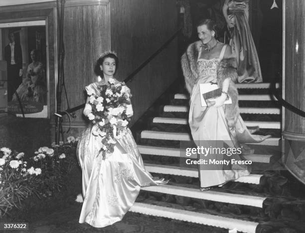 Princess Elizabeth, later Queen Elizabeth II of Great Britain, and Countess Mountbatten leave the film premiere of 'The Lady With A Lamp' at the...