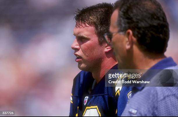 Quarterback Ryan Leaf and quarterbacks coach June Jones of the San Diego Chargers look on during a game against the Buffalo Bills at Qualcomm Stadium...
