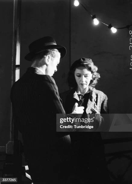 English actors Richard Attenborough and Dulcie Gray play Pinkie and Rose in the stage play 'Brighton Rock', based on the novel by Graham Greene....