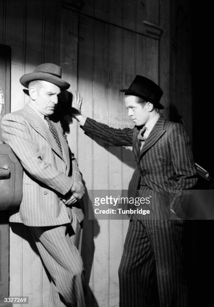 English actor Richard Attenborough plays Pinkie in the stage play 'Brighton Rock', based on the novel by Graham Greene. He played the same role in...