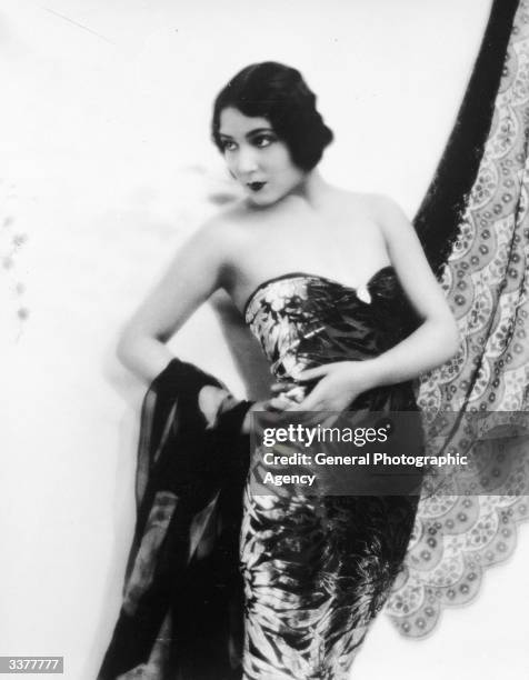 Mexican-born Hollywood film actress Dolores Del Rio wearing an evening dress.