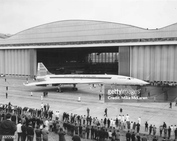 The second Anglo-French supersonic airliner, Concorde 002, rolls out of the British Aircraft Corporation's assembly line at Filton, Bristol, where it...