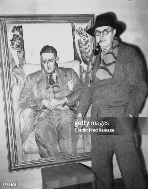 Artist Wyndham Lewis with his portrait of poet and author T S Eliot which has unexpectedly been rejected by the Royal Academy.