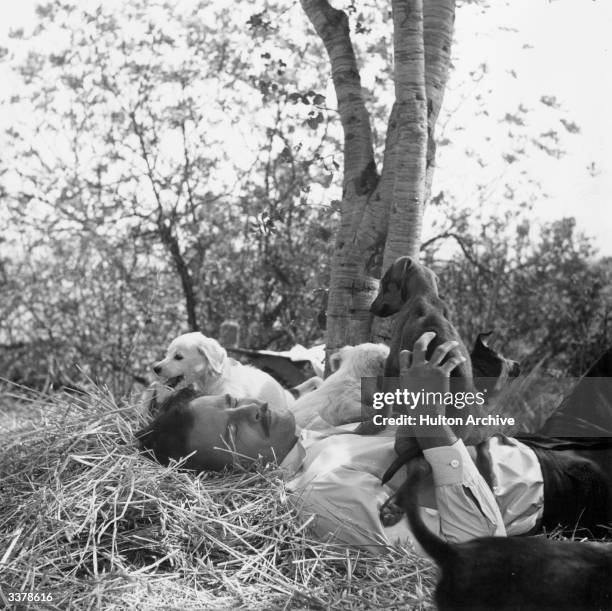 Marlon Brando has a break from filming 'Viva Zapata!' in which he stars as Mexican folk hero Emiliano Zapata, directed by Elia Kazan for 20th Century...